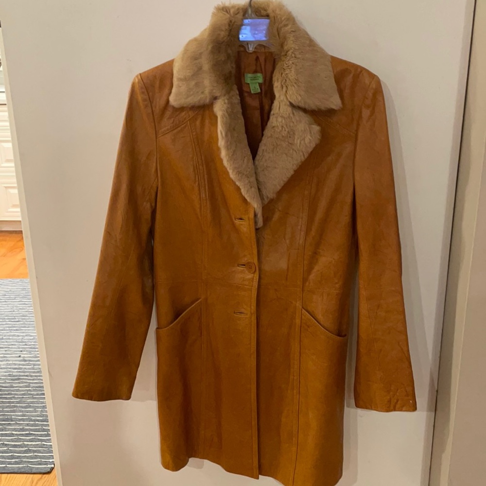 Woman’s leather coat.